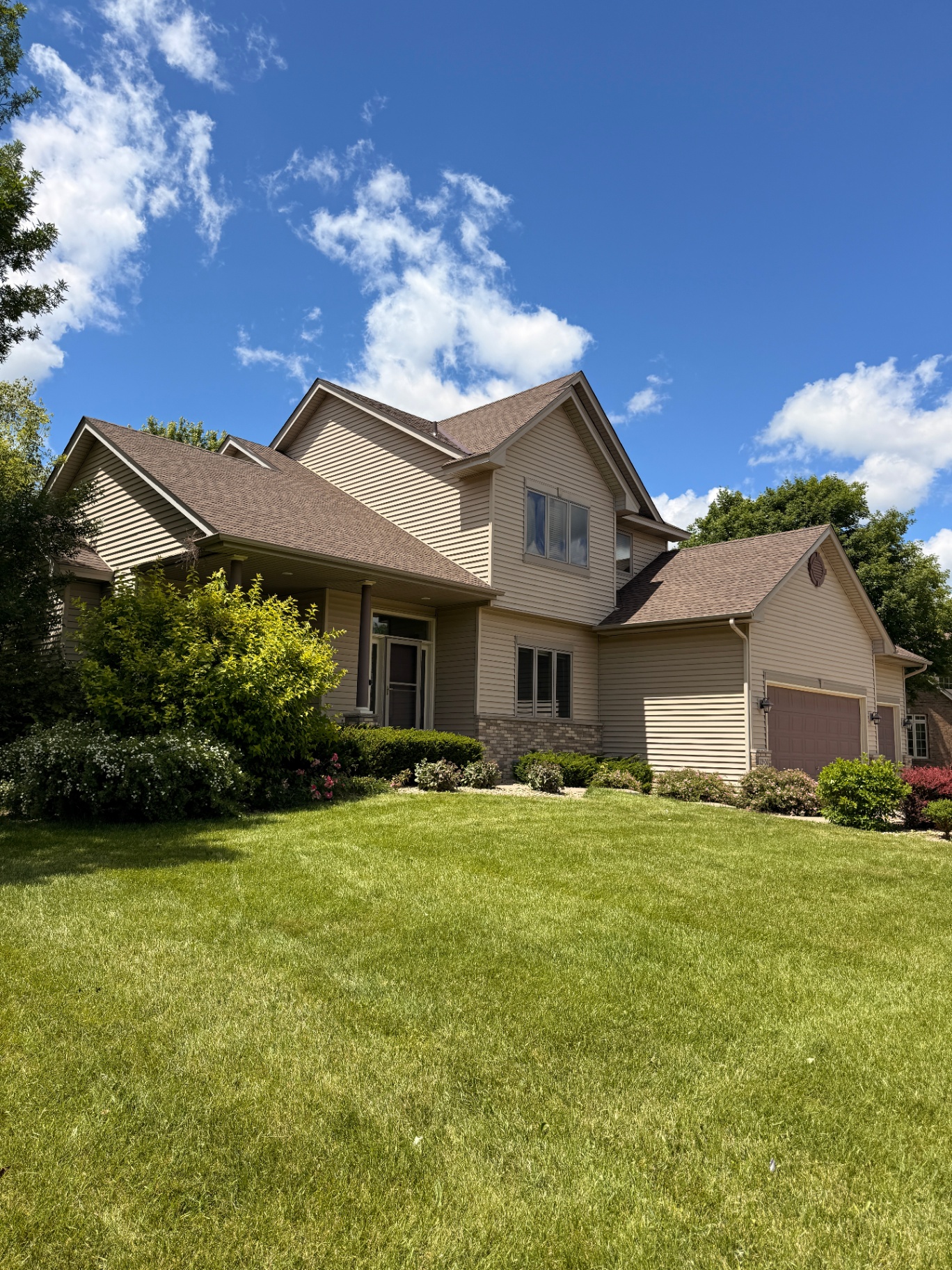 Storm-damage roof replacement in Rogers, MN