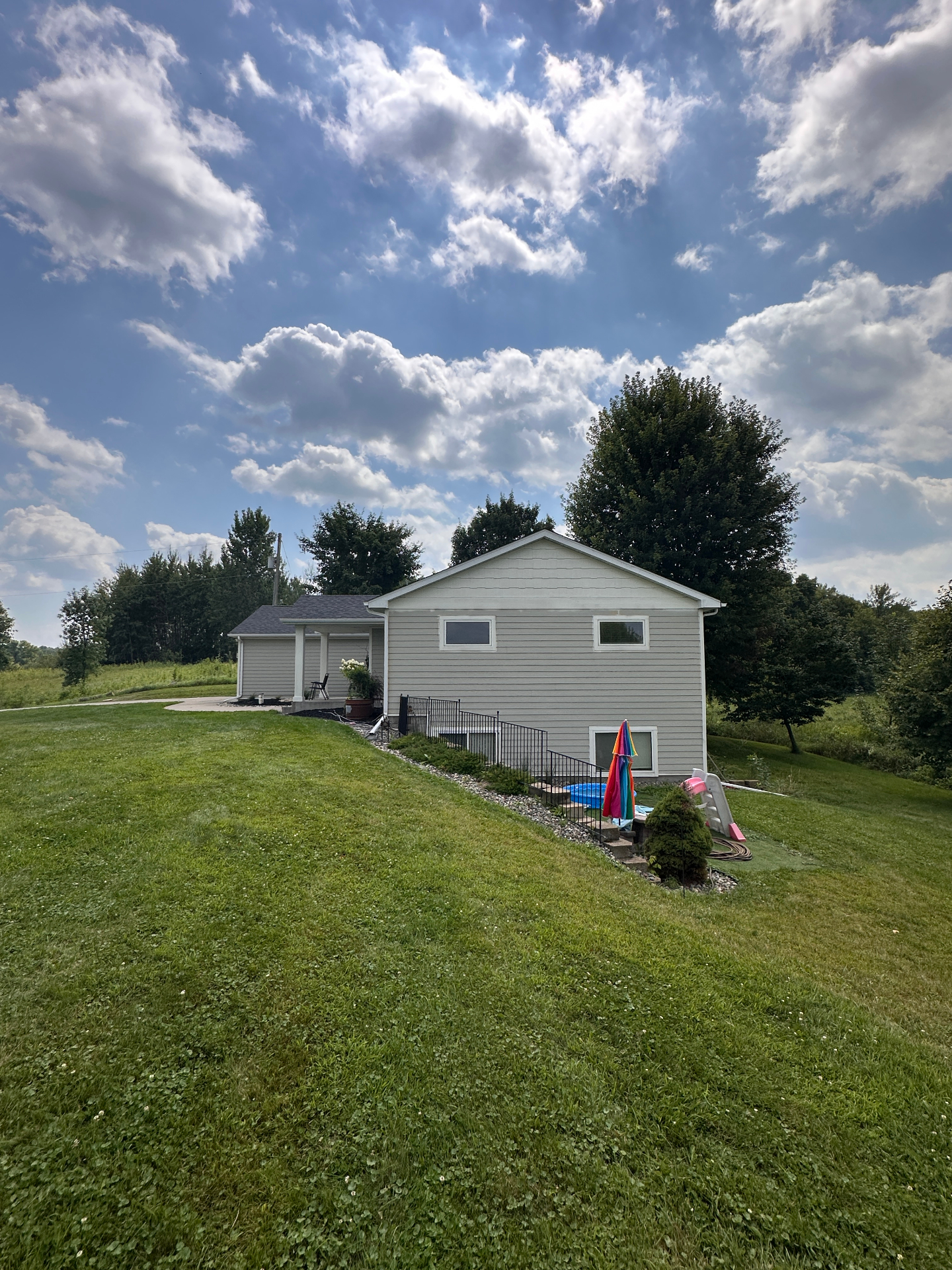 Right elevation view of the finished Owens Corning Duration roof replacement in Lindstrom, MN