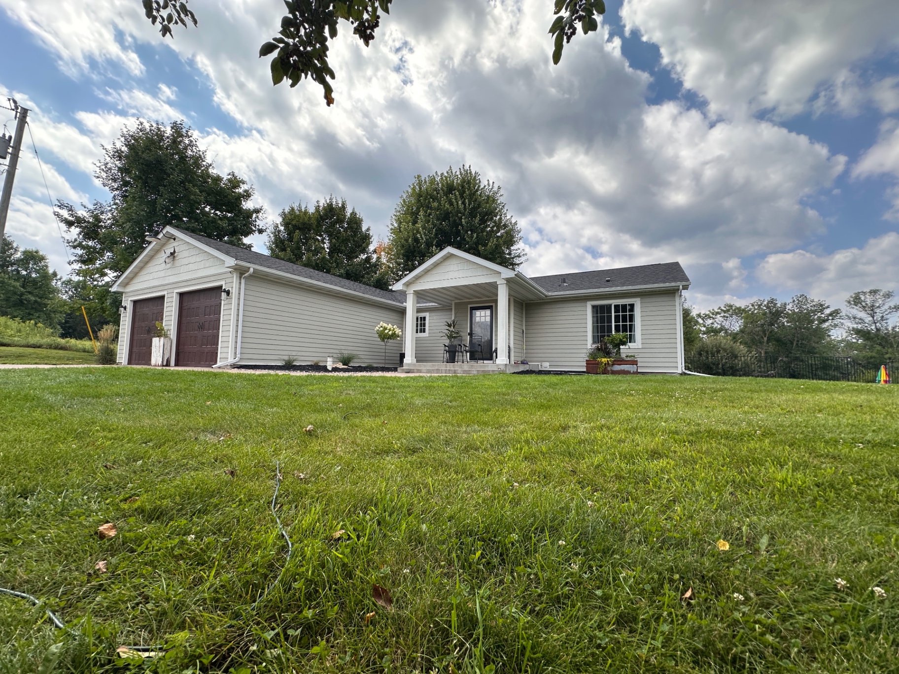 Side view of the completed roof replacement on a Lindstrom, Minnesota residence