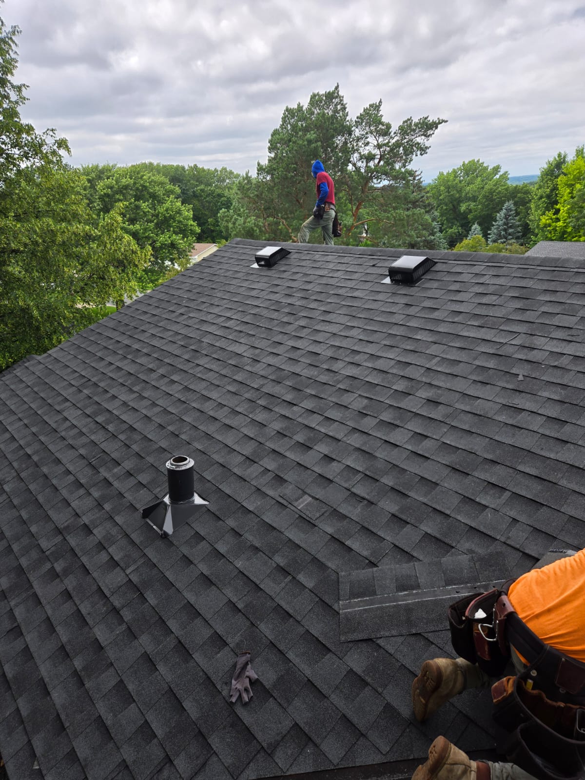 GAF Timberline HDZ charcoal shingles being installed on a Burnsville, MN home